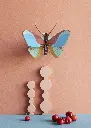 CLAUDINA-BUTTERFLY_AMBIENT-PORTRAIT.webp